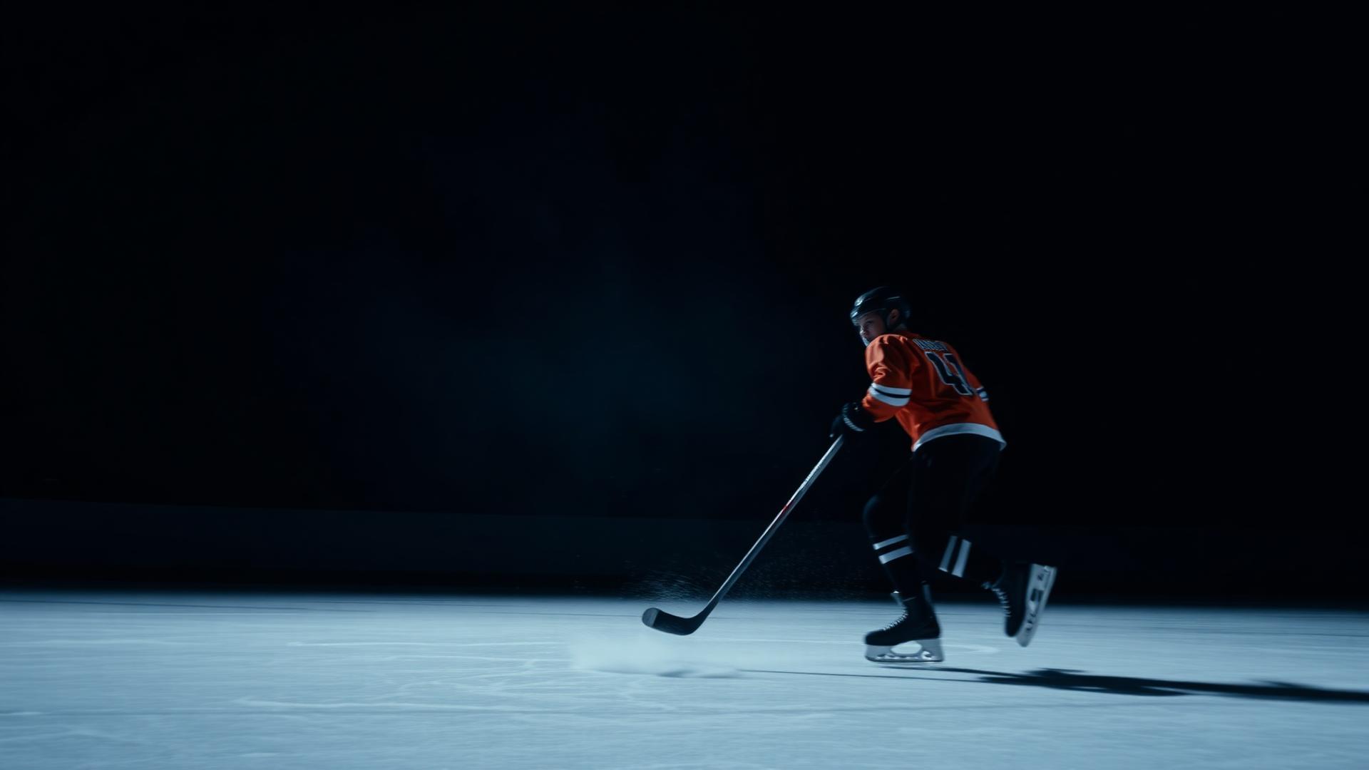 Outlaws hockey player skating on ice